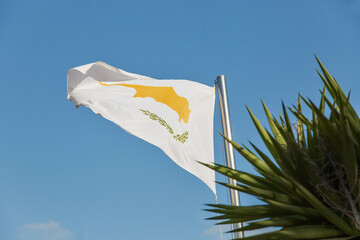 Cyprus flag waving against clear blue sky