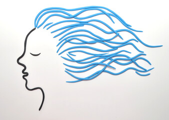 blue hair of a girl made of plasticine