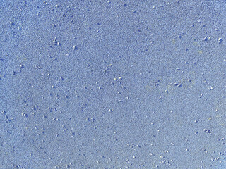 Rubber floor blue texture background. Granules playground cover seamless background.