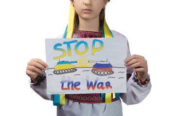 A little sad Ukrainian girl holds a drawing in her hands with the inscription 