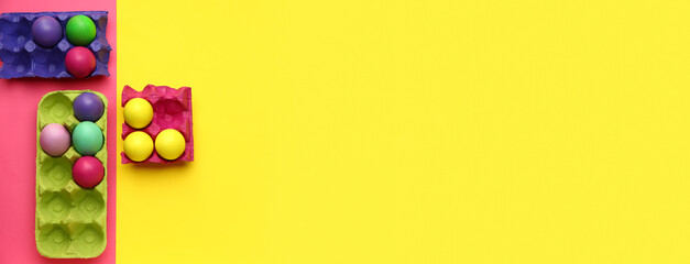 Holders with painted Easter eggs on color background with space for text