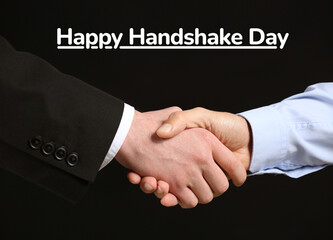 Businessmen shaking hands on black background. Happy Handshake Day