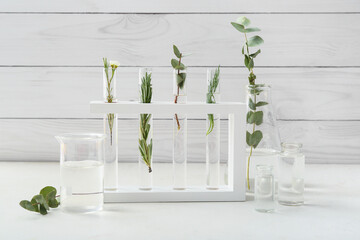 Glassware with natural essential oils in laboratory