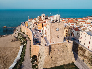Aerial photograph of the Svevo castle of Termoli in the Molise region of Italy which characterizes with its profile the image of the medieval village of the city  - obrazy, fototapety, plakaty