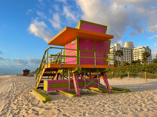 Iconic orange and pink lifeguard house in Miami Beach. Beautiful sky at sunrise