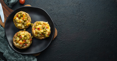 Artichoke dish with cheddar on black 