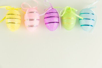 a lot of colorful Easter eggs on a white background