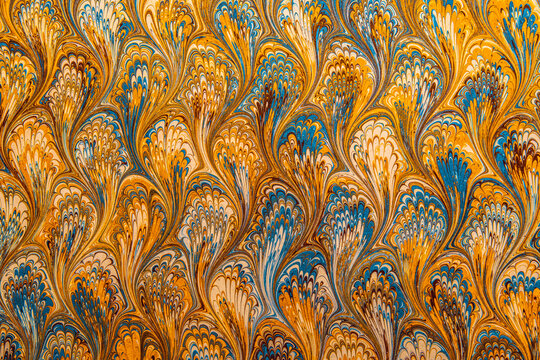 Rich colored marbled paper captured from close up