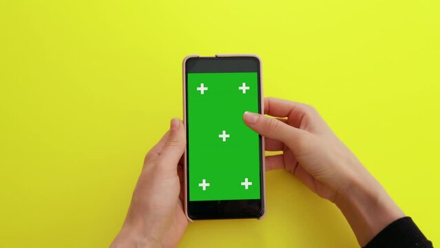 Scroll on Smartphone with Green Mock-up Screen Chroma Key, tracking points. Phone green screen for product placement. Gestures on touch screen.