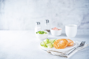 Shrimp patties with cucumber in a plate
