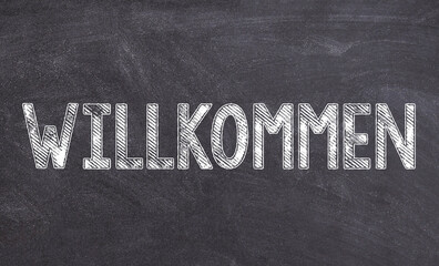 Willkommen sign on chalkboard german welcome © nanan