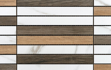 Ceramic tiles in the form of rectangles with wood color and texture.