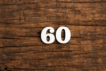 Number 60 - piece on rustic wood background