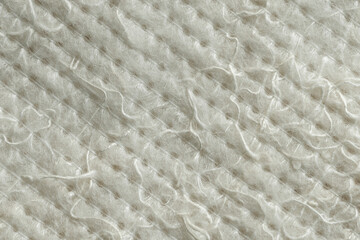 Classic floor cleaning cloth. Non woven dweil texture closeup as background