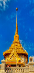 Fototapeta premium Traditional golden coated decorations at Buddhist temples in Thailand.