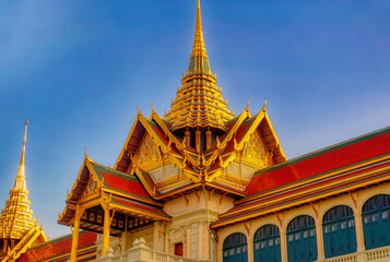 Fototapeta premium Traditional structure with decoration at Buddhist temple walls in Thailand.