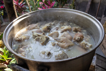 cooking delicious pozole, cooking delicious and traditional white pozole, cooked over firewood.cooking delicious pozole, cooking delicious and traditional white pozole.