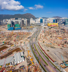 29 feb 2020 - Kowloon, Hong Kong : Massive construction site with crane and machine in Kai Tak...
