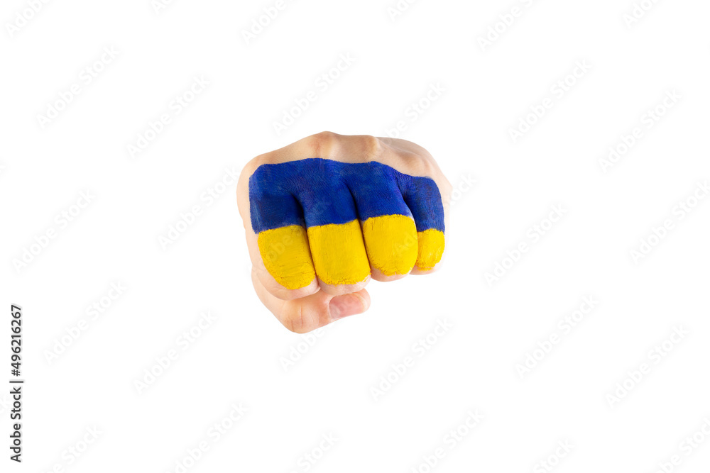 Wall mural fist with ukraine flag broke white paper wall and torn a hole. punch through the wall. street fight 