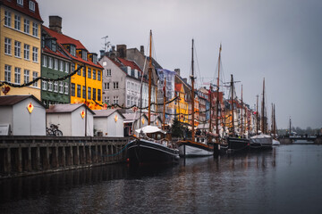 Copenhagen, Denmark on the Nyhavn Canal at sunset. November 2021