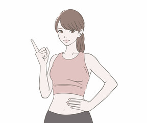 人差し指を立てるスポーツインストラクターの女性