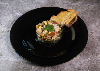 Cod Ceviche recipe, bread in oil and garlic.