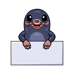Cute little mole cartoon with blank sign