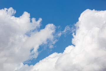 Beautiful white and gray clouds against a beautiful blue desert sky in the American Southwest. Large puffy and wispy cloudscapes, fresh clean air.