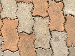 Tile bricks pattern of pedestrian walkway in the park
