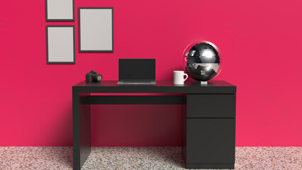 Home office desk with magenta wall and black table with laptop and disco ball