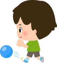 ボールを蹴って遊ぶ男の子