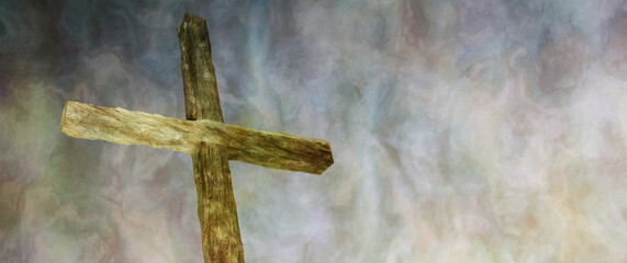 rough wood cross with turbulent background with copy space suitable for text like worship lyrics,...