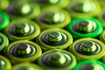 Closeup of positive ends of discharged batteries AA sizes, macro shot, selective focus. Used...