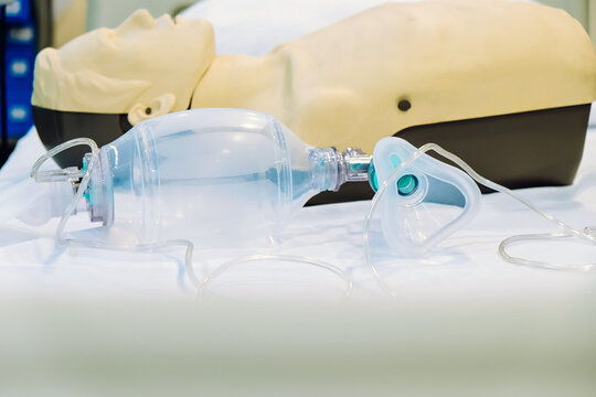  Image of CPR dummy with defibrillator 