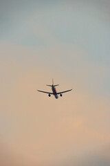 Air transportation system used to transport people and goods by air. Fresh blue sky, colorful sky wide airplane, pink and pastel color of sky, sunlight and sunset view.