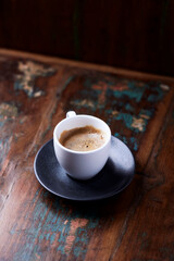  Cup of coffee on rustic wooden background. Copy space.