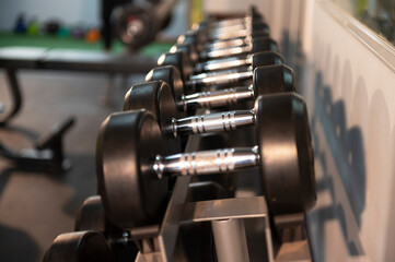 Heavy barbells on the floor of the gym studio copyspace bodybuilding weightlifting fitness power strength endurance agility exercise exercise