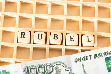 Eine Rubel Banknote und das Wort Rubel