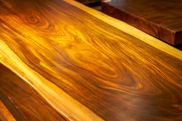 Mahogany planks and mahogany table tops for sale in the market