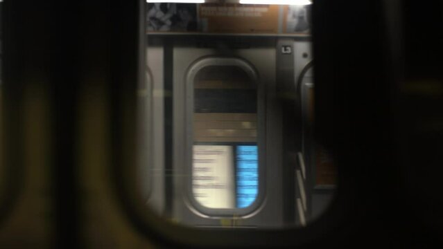 MTA Subway Train In NYC exiting Station seen inside another train Starting. Metropolitan transit Authority Car