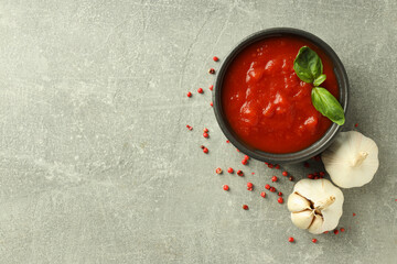 Concept of spicy sauce with Adjika, space for text