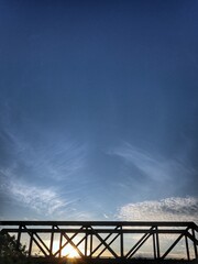 Fototapeta na wymiar sunrise at an old train bridge