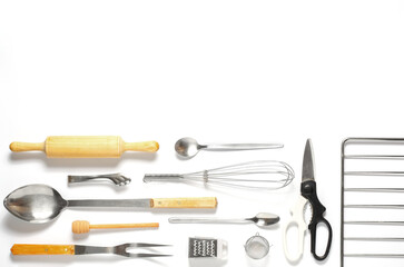 Fototapeta premium Wooden and metal kitchen utensils. Tools for cooking. White background. Flat lay