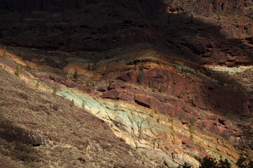 Gran Canaria, colorful unusual rock formation Fuente de los Azulejos in Mogan municipality in south...