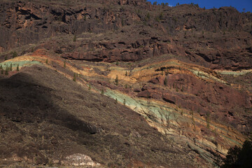 Gran Canaria, colorful unusual rock formation Fuente de los Azulejos in Mogan municipality in south...