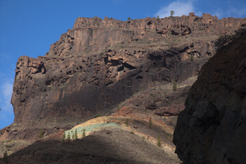 Gran Canaria, colorful unusual rock formation Fuente de los Azulejos in Mogan municipality in south...