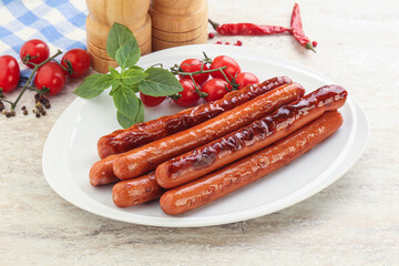 Roasted sausages in the plate