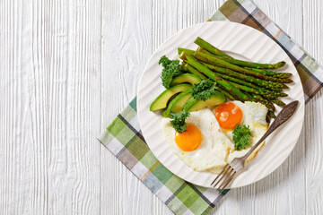 roast asparagus, ripe avocado and fried eggs