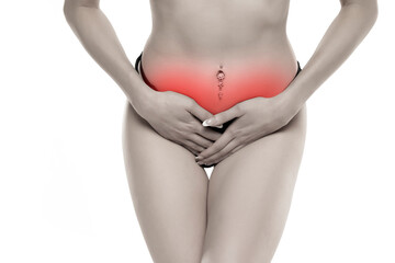 Young female suffering form abdominal pain on white background .
