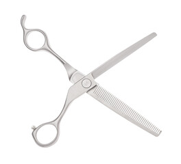 Scissors for cutting people and pets. Grooming scissors. Opened scissors on a white isolated background. Side view.